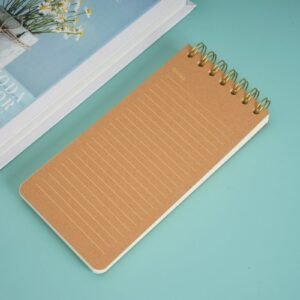 A spiral notebook with a cute wooden design.